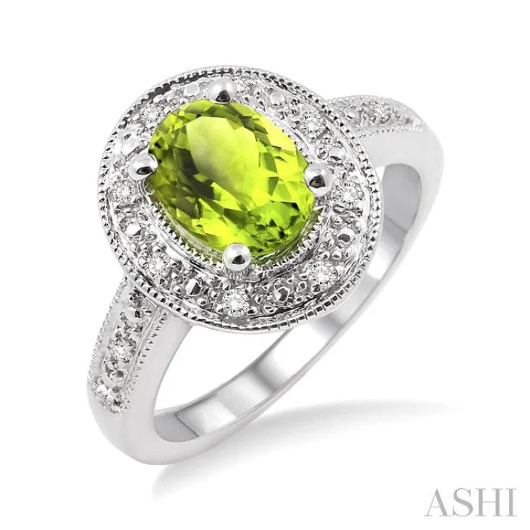 women’s heart-shaped engagement rings-8x6 MM Oval Cut Peridot and 1/20 Ctw Single Cut Diamond Ring in Sterling Silver