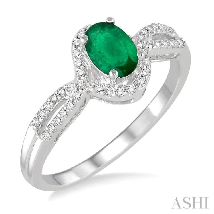 women’s unique rings-6x4 MM Oval Cut Emerald and 1/6 Ctw Round Cut Diamond Ring in 10K White Gold