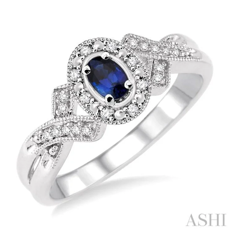 women’s three-stone rings-5x3 mm Oval Cut Sapphire and 1/50 Ctw Single Cut Diamond Ring in Sterling Silver